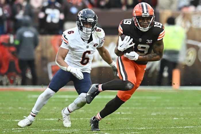 Dec 17, 2023; Cleveland, Ohio, USA; Cleveland Browns wide receiver Cedric Tillman (19) runs with the ball after a catch as Chicago Bears cornerback Kyler Gordon (6) defends during the second half at Cleveland Browns Stadium.